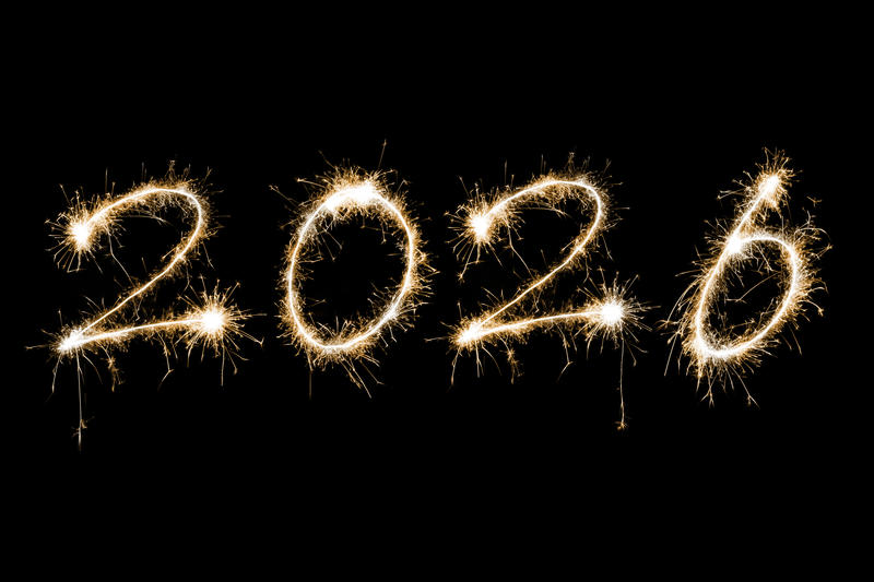 Golden sparkling fireworks, concept of a Happy new year holiday 2026 over black background