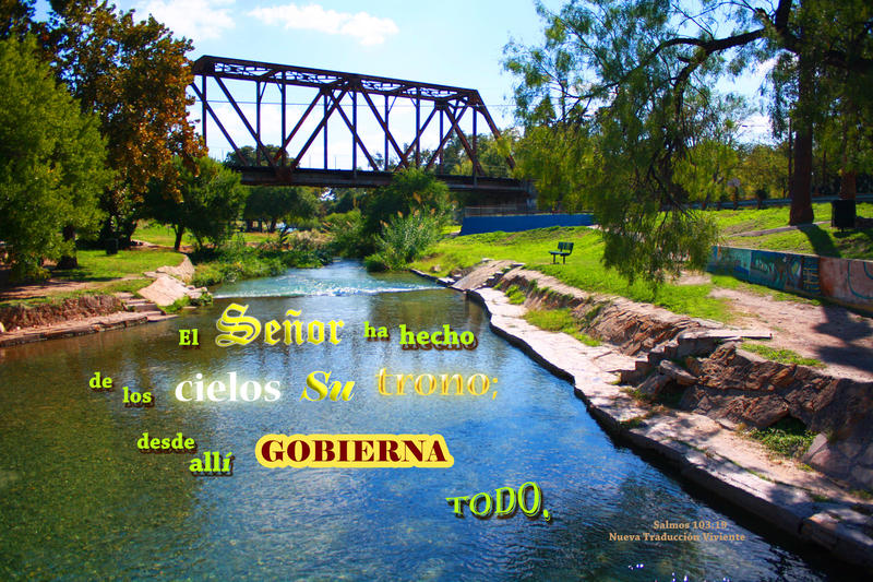 <p>Creek running through a park with a railroad bridge in the background</p>
Creek running through a park with a railroad bridge in the background