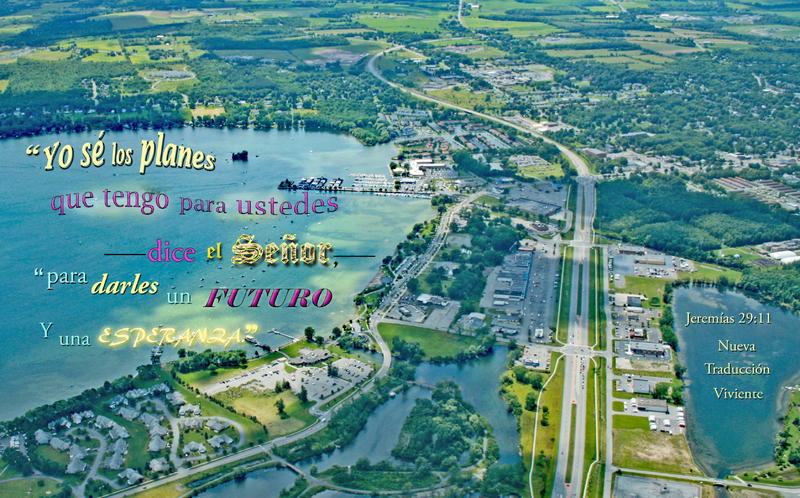 <p>Airplane view: a highway runs across a lake near a marina with lots of boats</p>
Airplane view: a highway runs across a lake near a marina with lots of boats
