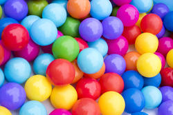 17843   Close up of multicoloured plastic balls in pit