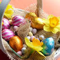 stock image 17331   Basket of easter eggs, decorated with daffodils