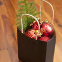 17277   Paper bag filled with Christmas decorations