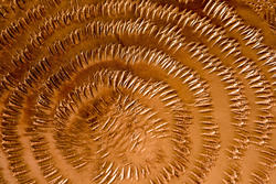 17760   Beaten circular pattern on sheet metal copper