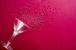17298   Cocktail glass party background on red