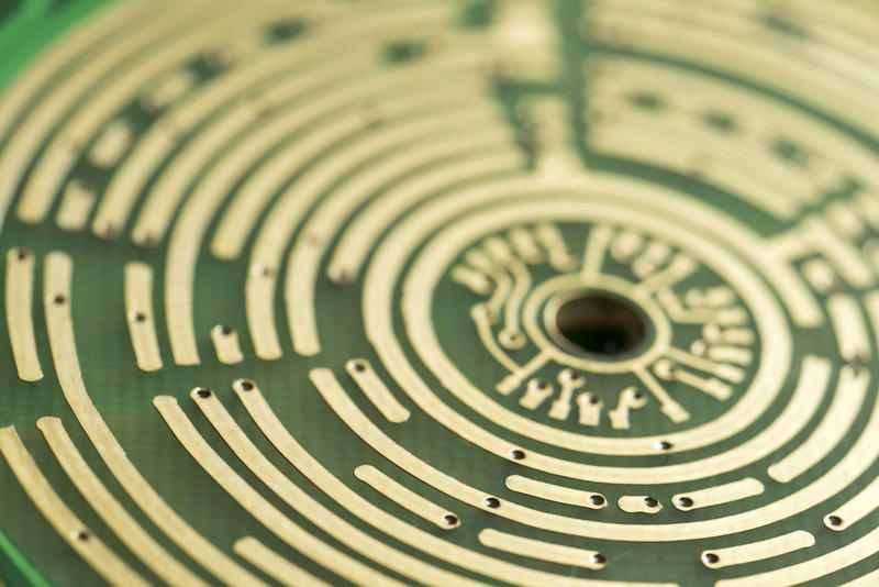 curved broken copper tracks, details of the inner workings of an electronic switch
