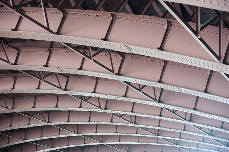 Details of metals trusses and beams on a bridge in a structural engineering and architectural design concept