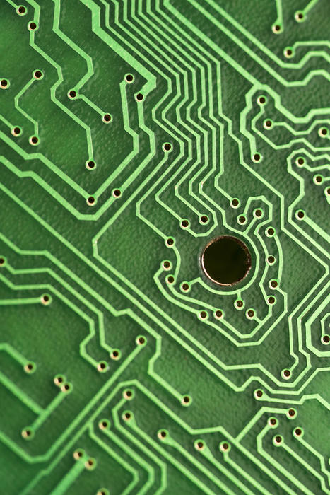 vertical image of tracks on an electronic circuit board