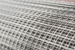 17764   Close up on a large roll of fencing wire mesh