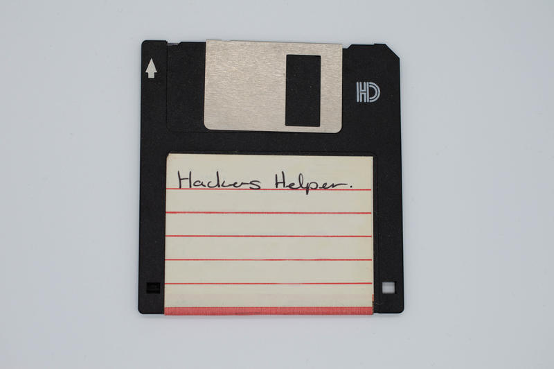 <p>Floppy disk with Hackers Helper on label. Used for retro computing from the 1990's. See more pics at https://www.dreamstime.com/dawnyh_info</p>
Floppy disk - Retro computer