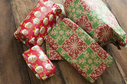 17281   Colourful wrapped Christmas gifts on rustic wood