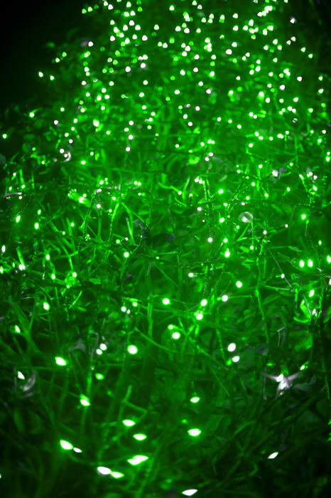 background of green coloured led lights, blurred in the distance