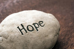 17411   The word Hope incised onto resin or stone