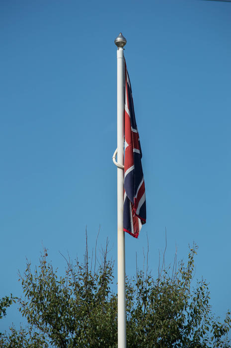 <p>Armed Forces Memorial on the Fylde Coast.</p>

<p>More photos like this on my website at -&nbsp;https://www.dreamstime.com/dawnyh_info</p>
Flag at Memorial park