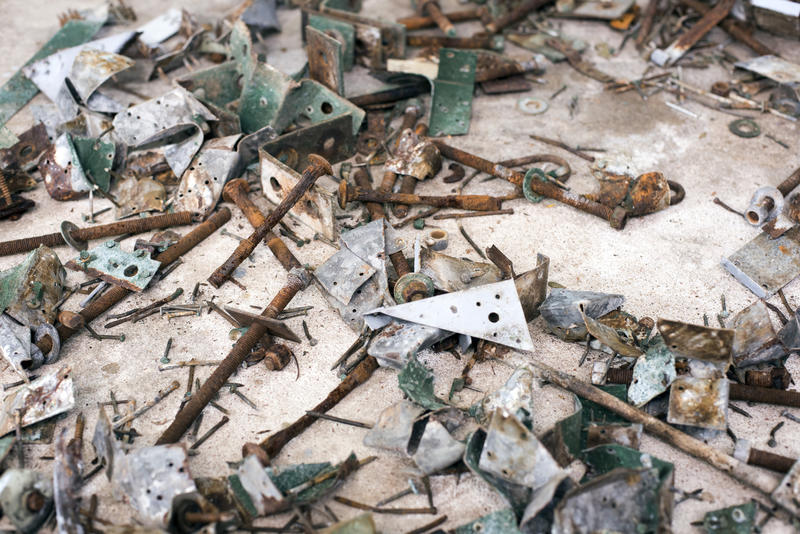 Full frame background of old rusty scrap metal components or parts conceptual of industry