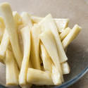 17250   Fresh cleaned sliced parsnip wedges in a bowl