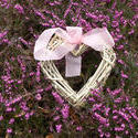 stock image 17362   Rustic hand crafted wicker heart on pink heather