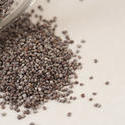 17253   Heap of scattered dried poppy seeds