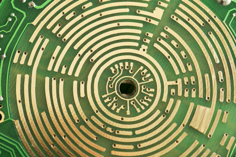 rings of copper tracks, a macro image of the workings of a rotary electronic switch
