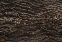 17780   Dark brown wavy wooden texture