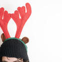 17288   Person wearing a pair of festive red deer antlers