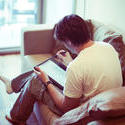 stock image 17405   Young man working from home during Covid 19