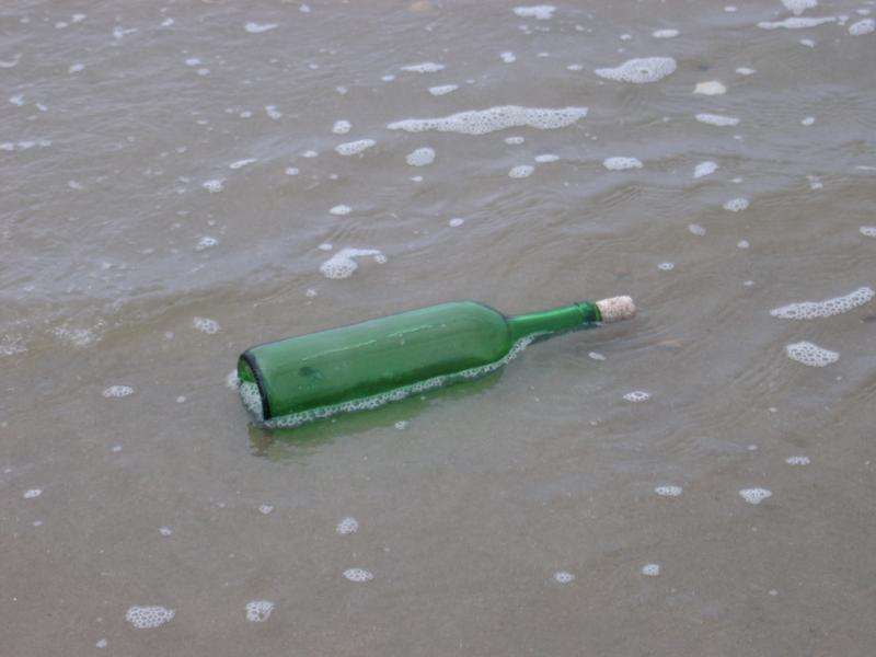 message in a bottle: concept of communications and luck in contacting someone