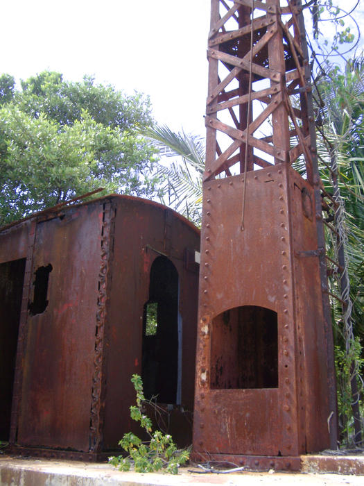 remains of a rusty old radio mast, punta allen, mexico