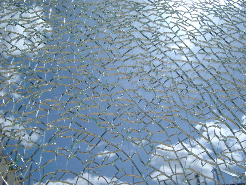 a shattered toughened glass window