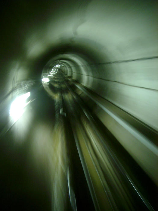 traveling through an underground railway tunnel