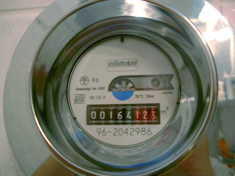 a hot water meter: concept of energy spending and fuel use