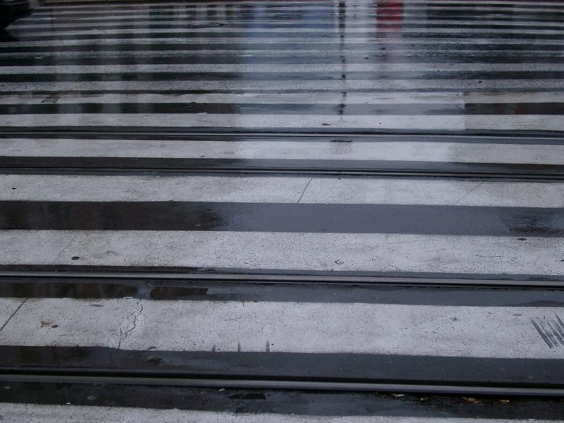 perspective pattern on a wet zebra crossing
