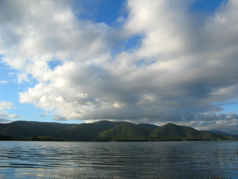 rain clouds over the tineroo falls dam reservoir, queensland, australia
