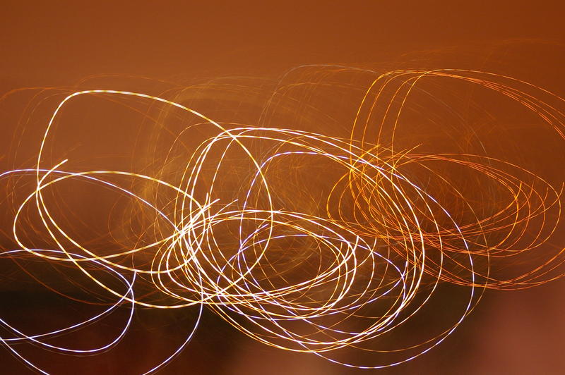 abstract glowing light swirls