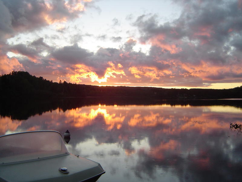 sunset over a lake in Algonquin provincial park, Ontario, Canada
