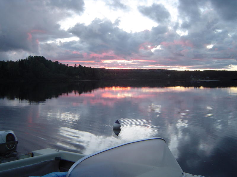 sunset over a lake in Algonquin provincial park, Ontario, Canada