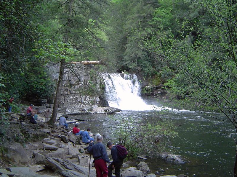 hikers at a beauty spot - waterfall cascade