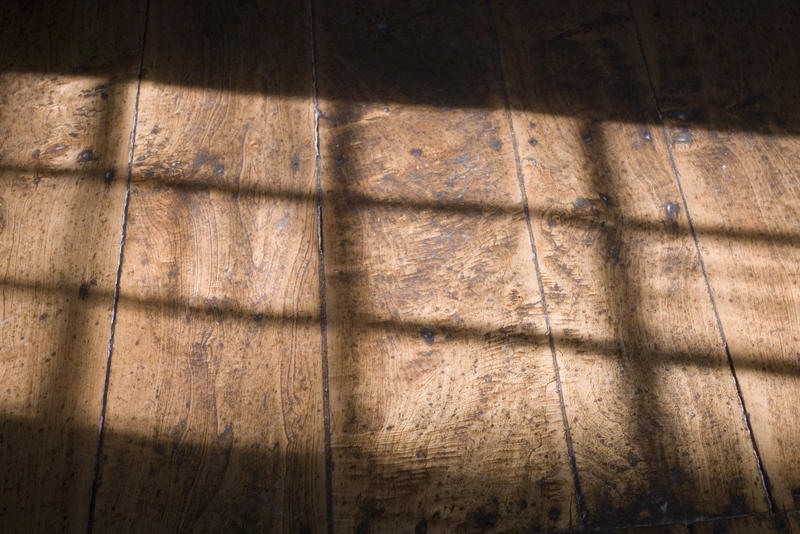 pattern of window light on a traditional wooden floor