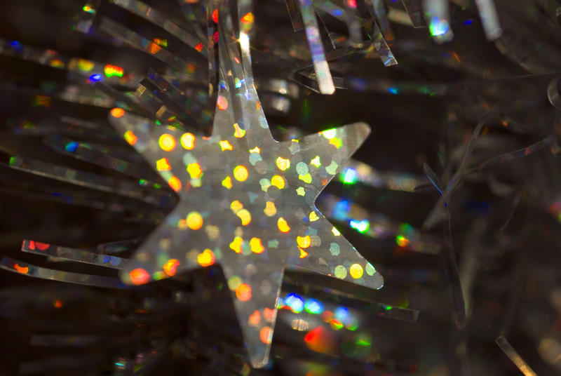 festive star decoration exhibiting iridescent colours