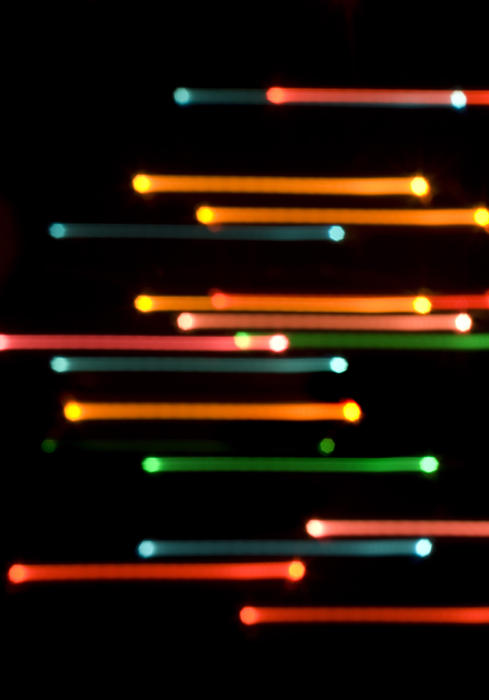 streaking lines of parallel coloured lights