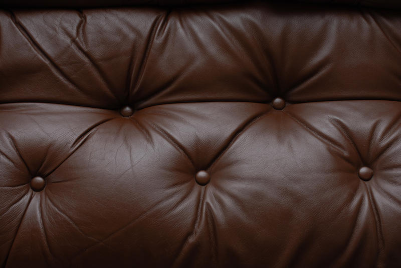 <p>Brown leather sofa background texture. A High Resolution version of this image is available <a href="http://alexhd57.clustershot.com/photo764100">here</a>.</p>Leather sofa background texture