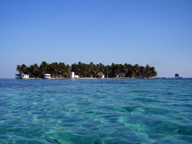 Tropical island paradise, tobacco caye a tiny coral island off the coast of Belize   