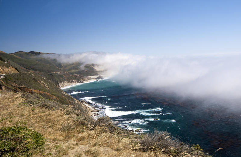 a layer of mist over the bigsur coast line