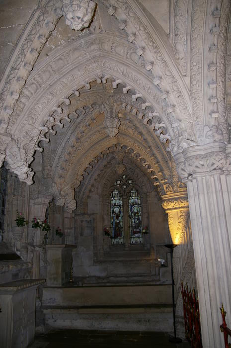 an alcove window in a gothic stone church