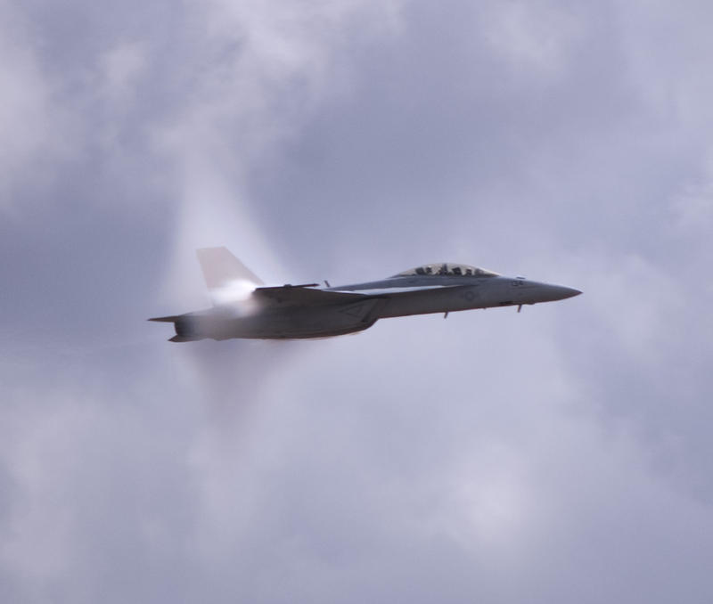 Transonic flight, a cloud of vapour formed as a  FA-18 Super Hornet breaks the sound barrier