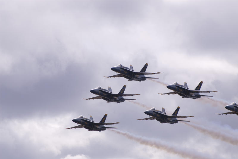 delta formation flying from a blue angels air display