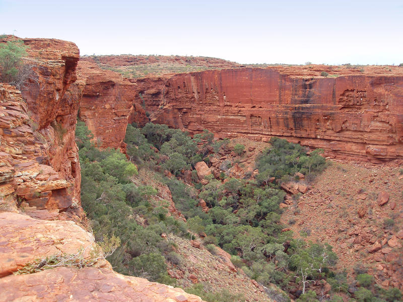 A view of a spectacular sheer cliffs face on the edge of kings canyon, Watarrka national park, NT