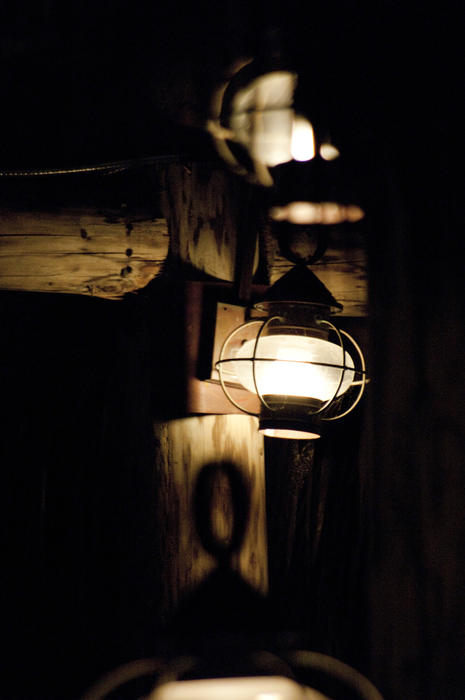 an old style lantern lit at night