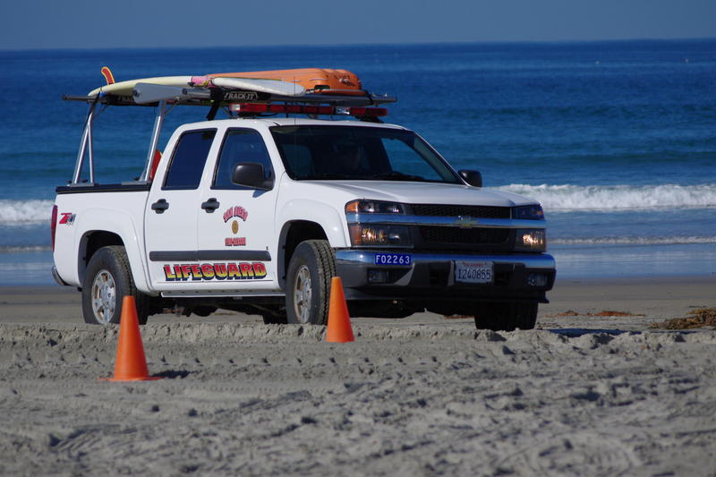 a lifeguard truck on the beach