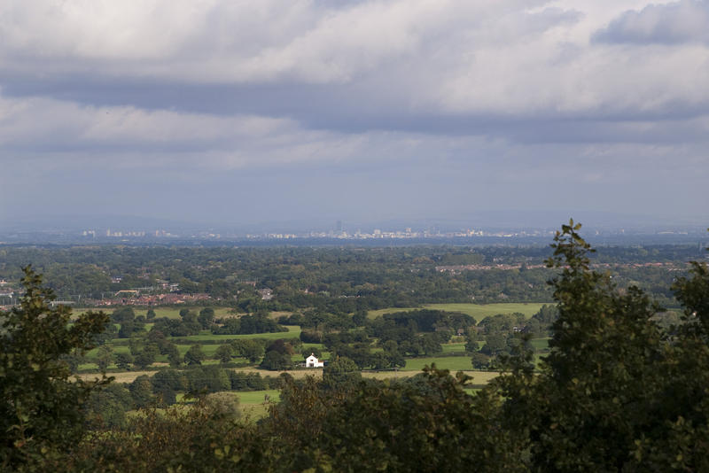 views of the city of manchester in the far distance from lyme park, cheshire