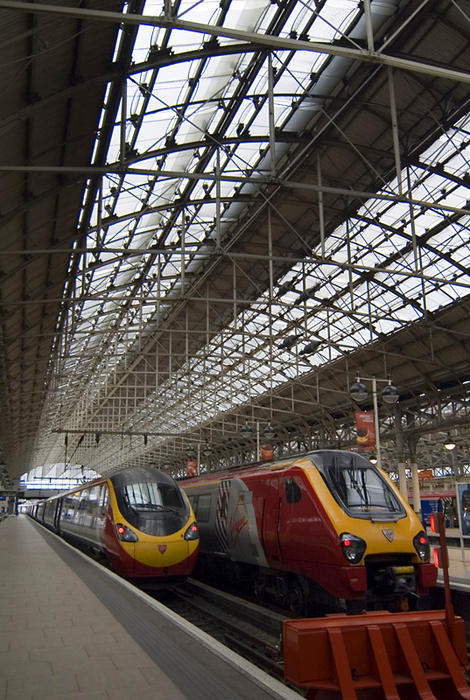two virgin trains at manchesters piccadilly railway station